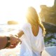 Couple on beach holding hands